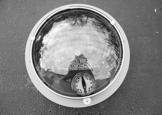 A solar site analysis for the entire year can be done with a variety of tools, perhaps the niftiest of which is the Solar Pathfinder. A clear dome reflects any potential obstructions and projects them onto the path of the sun for each individual month.